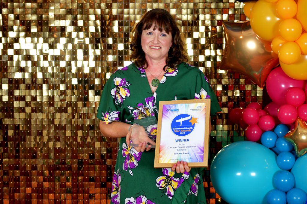 Joanne Jones winning the Customer Service Excellence award